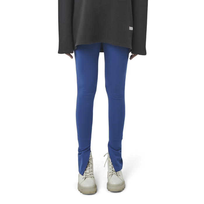 Classic leggings in blue fabric featuring Eighteen Eighty-Six logo patch sewn at Elastic waistband. Open at ankle cuffs.