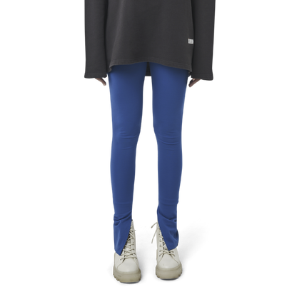 Classic leggings in blue fabric featuring Eighteen Eighty-Six logo patch sewn at Elastic waistband. Open at ankle cuffs.