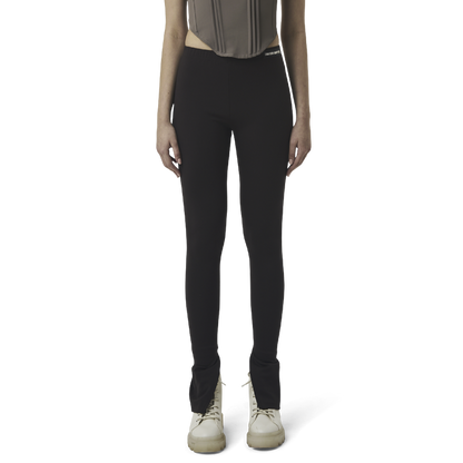 Classic leggings in coffee brown fabric featuring Eighteen Eighty-Six logo patch sewn at Elastic waistband. Open at ankle cuffs.