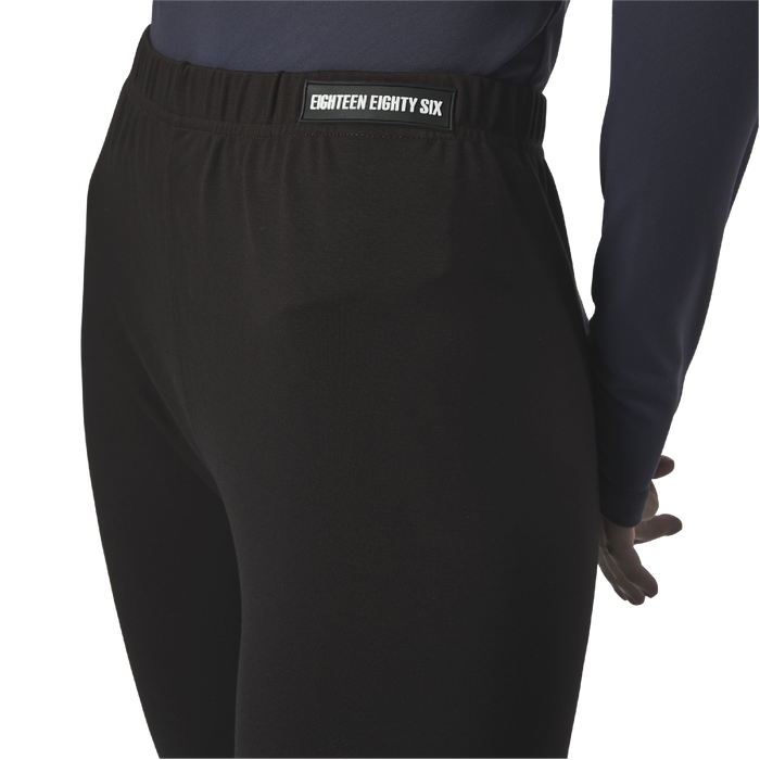 Classic leggings in coffee brown fabric featuring Eighteen Eighty-Six logo patch sewn at Elastic waistband. Open at ankle cuffs.