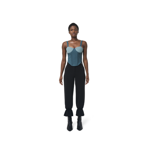 Cropped corset top in mix blue fabric color featuring lines details at front. logo patch sewn at Scoop neck. Full zipper at back.