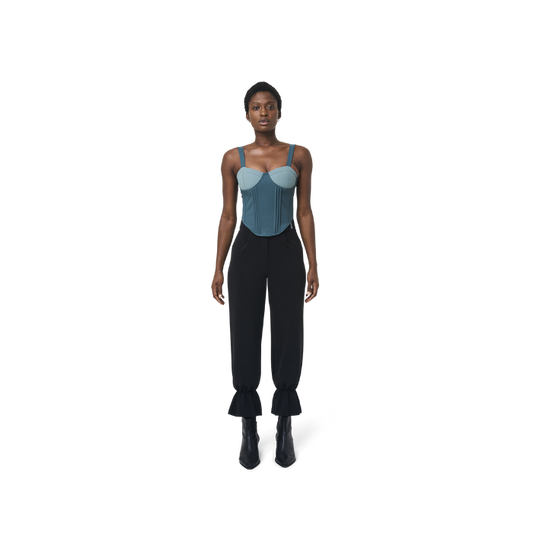 Cropped corset top in mix blue fabric color featuring lines details at front. logo patch sewn at Scoop neck. Full zipper at back.