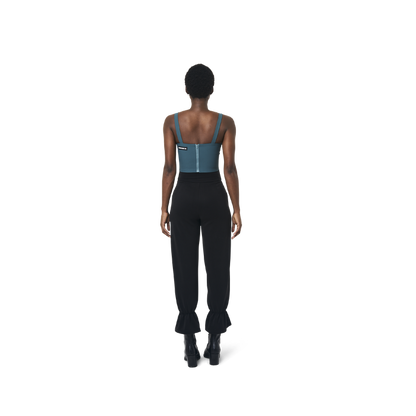 Cropped corset top in mix blue fabric color featuring lines details at front. logo patch sewn at Scoop neck. Full zipper at back.