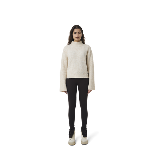 Long sleeves highneck cut wool sweater in beige color fabric featuring 1886 logo embroidered at bottom front. Loose at cuffs and hem.