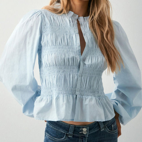 Skyline Ruched Peplum Top