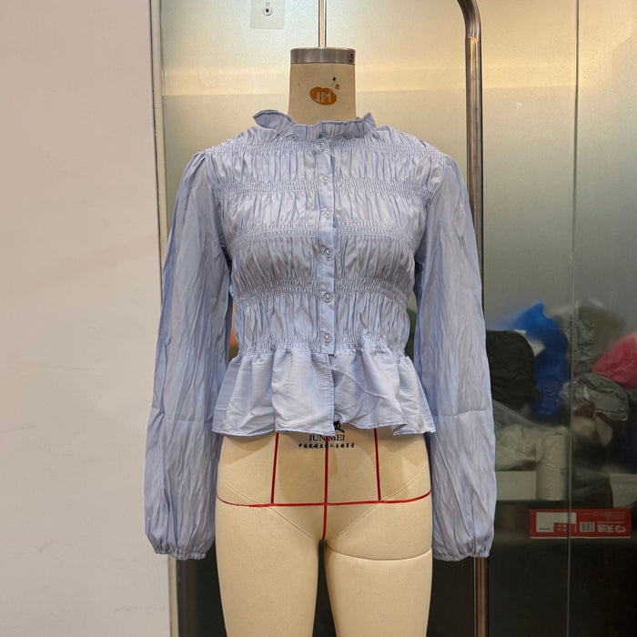 Skyline Ruched Peplum Top