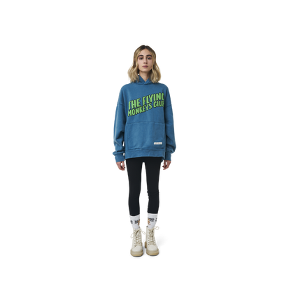 Long sleeves oversize cut hoodie in washed sapphire blue color fabric featuring  ' The Flying Monkeys Club ' logo print at front and at back. 1886 logo embroidered at kangaroo pocket. Rib knit at cuffs and hem.