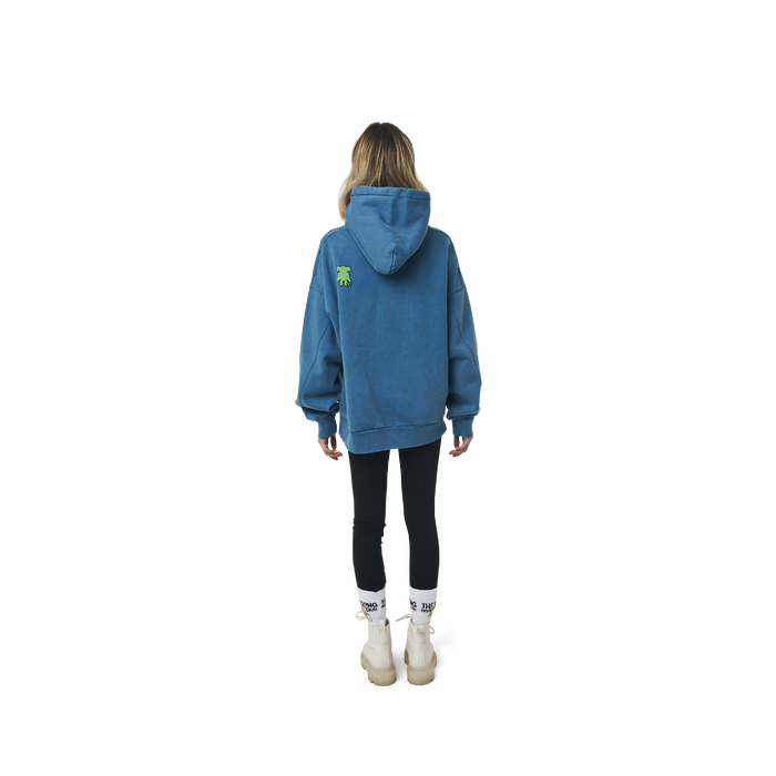 Long sleeves oversize cut hoodie in washed sapphire blue color fabric featuring  ' The Flying Monkeys Club ' logo print at front and at back. 1886 logo embroidered at kangaroo pocket. Rib knit at cuffs and hem.