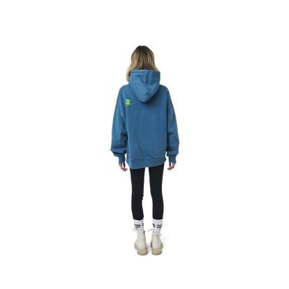 Long sleeves oversize cut hoodie in washed sapphire blue color fabric featuring  ' The Flying Monkeys Club ' logo print at front and at back. 1886 logo embroidered at kangaroo pocket. Rib knit at cuffs and hem.