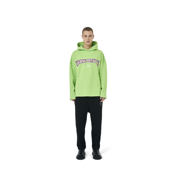 Long sleeves Loose cut hoodie in neon green color fabric featuring Eighteen Eighty-Six print at front. 1886 logo embroidered at bottom front. Loose at cuffs and hem.