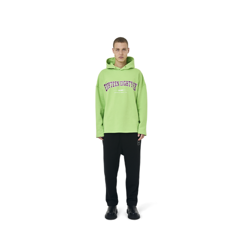 Long sleeves Loose cut hoodie in neon green color fabric featuring Eighteen Eighty-Six print at front. 1886 logo embroidered at bottom front. Loose at cuffs and hem.